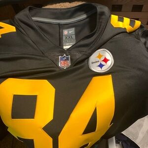 A Brown color rush jersey by Nike